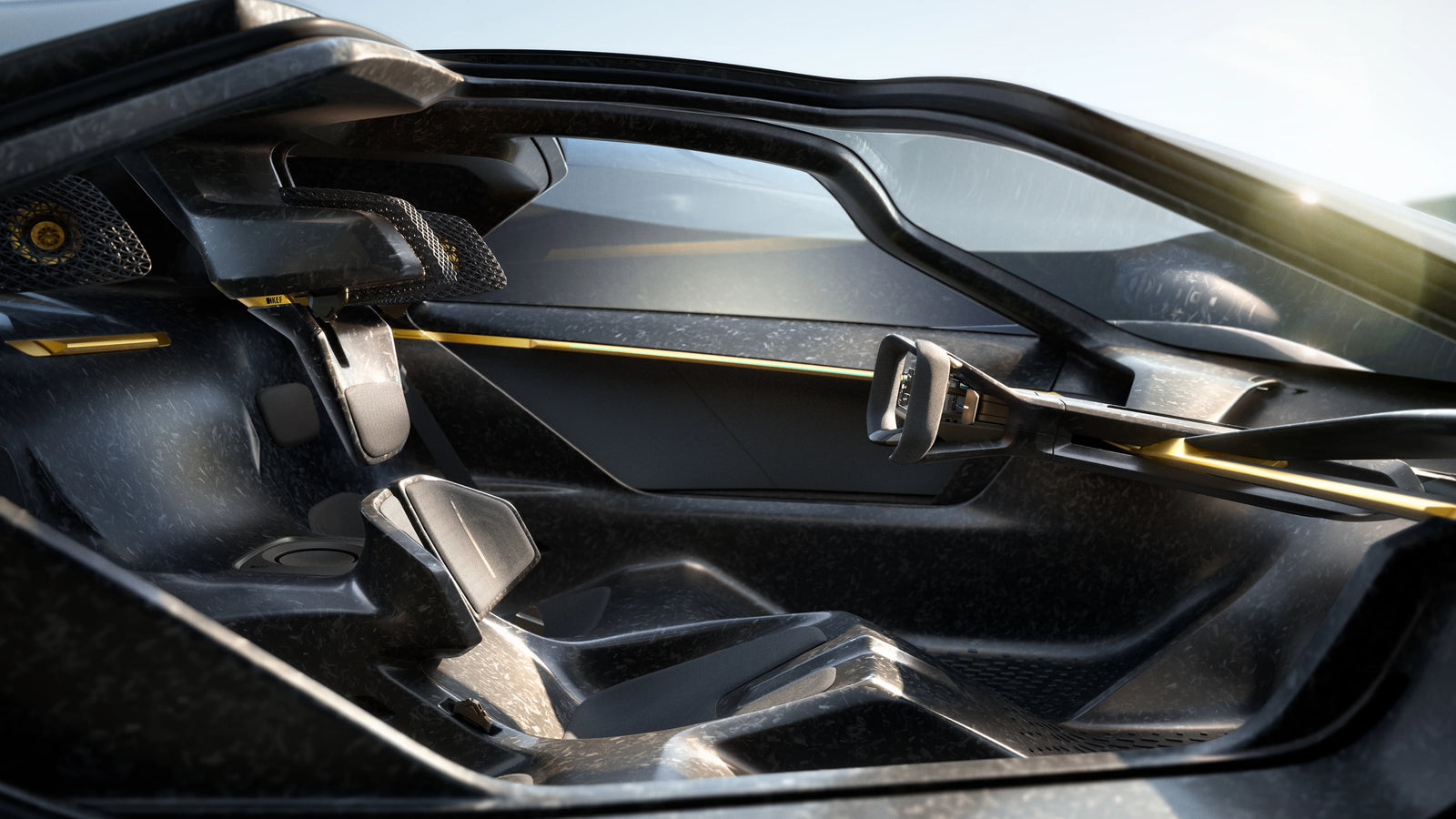 Close-up Lotus Theory 1 car interior with a black bucket seat, carbon-fiber textured door panel, and thin gold accent strip.